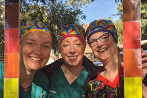 Nurses in rainbow hats